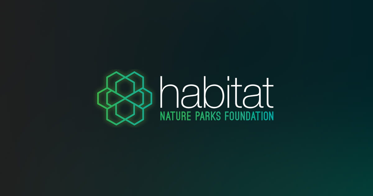 Logo of Habitat Nature Parks Foundation with a green hexagonal geometric design on a dark background.
