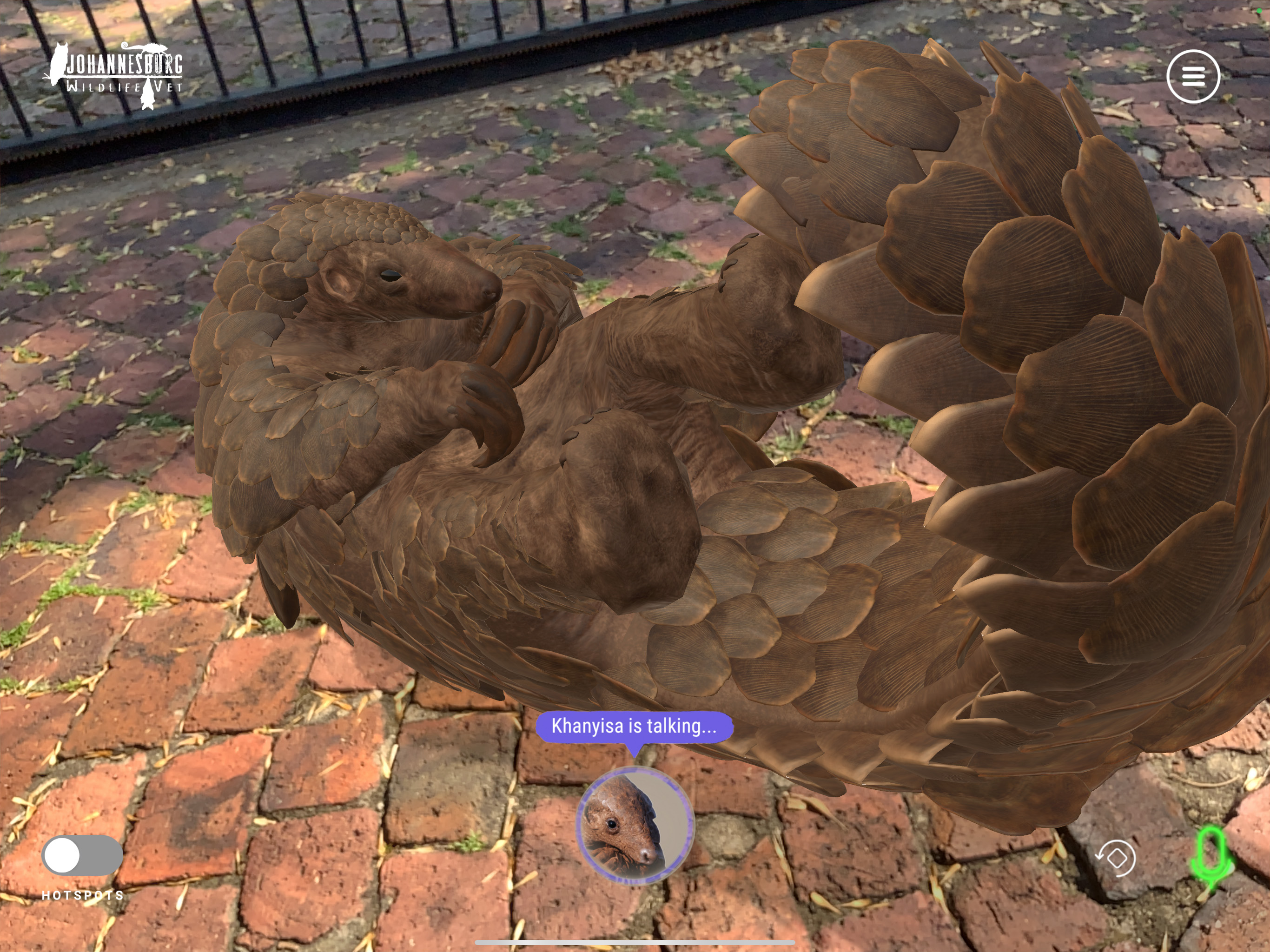 A diver operates a custom underwater 360° camera rig on an extended pole, capturing immersive footage in open ocean conditions.